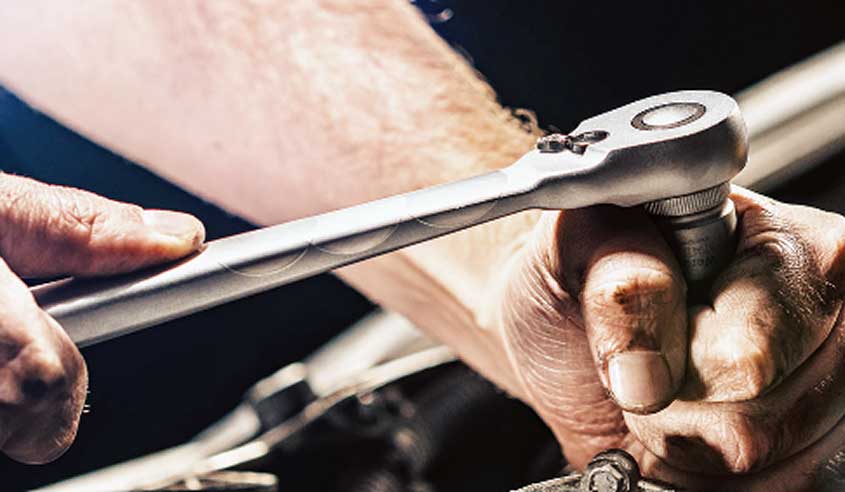 Ultra Tube mechanic servicing car