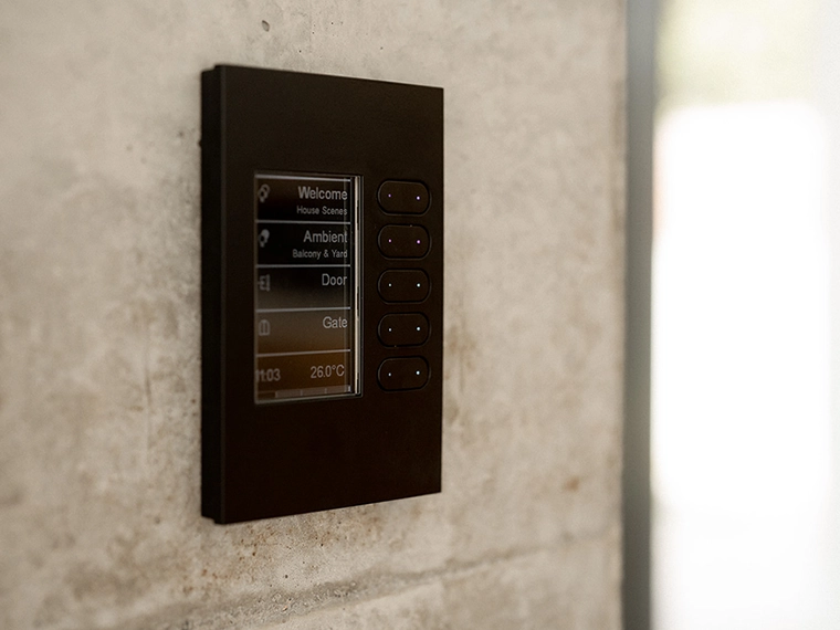 C-Bus wall panel with options for lights, doors, gates, plus time and temperature display.