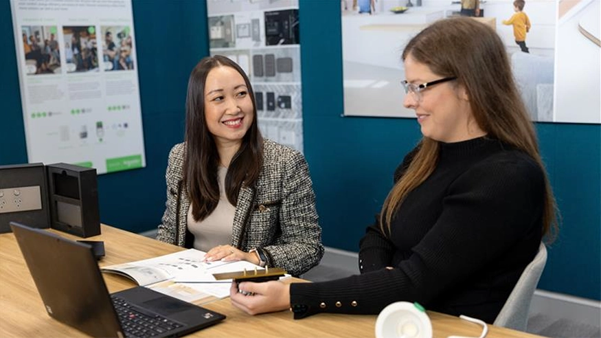 A Clipsal Design Service consultant with a client during a consultation.