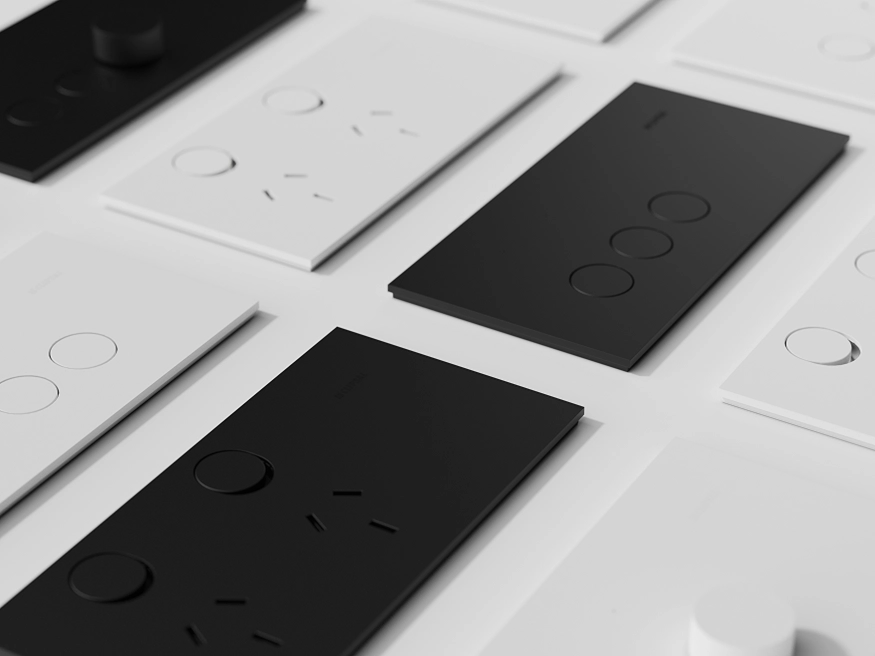 A collection of Solis Matte White and Matte Black switches and power outlets.