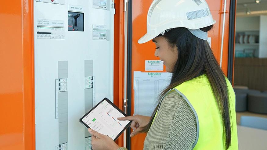 A contractor using the FlexSelect application for switchboard customisation.