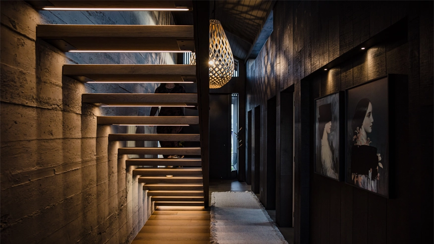 A stairwell in a home fitted with Clipsal Wiser Smart Home systems