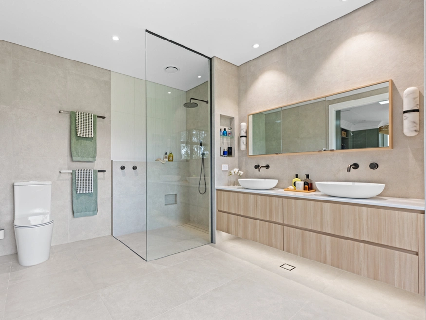 A stylish bathroom with Clipsal Wiser Smart Home systems installed.