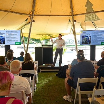 A Club Clipsal staff member presenting at the AMPED26 event.