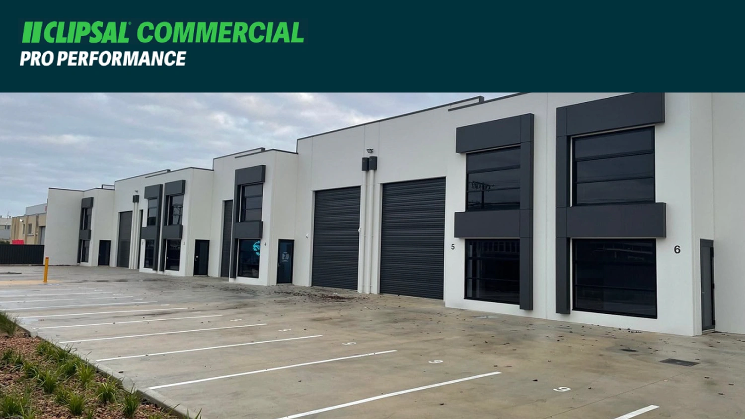 An exterior photo of Mint Electrical’s multi-warehousing project, overlaid with the Clipsal Commercial logo.