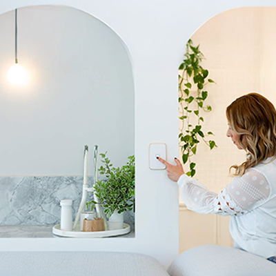 A woman using an Iconic switch.