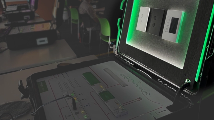 A Clipsal SpaceLogic C-Bus display case, showing C-Bus dimmers, controllers, and eDLTs.