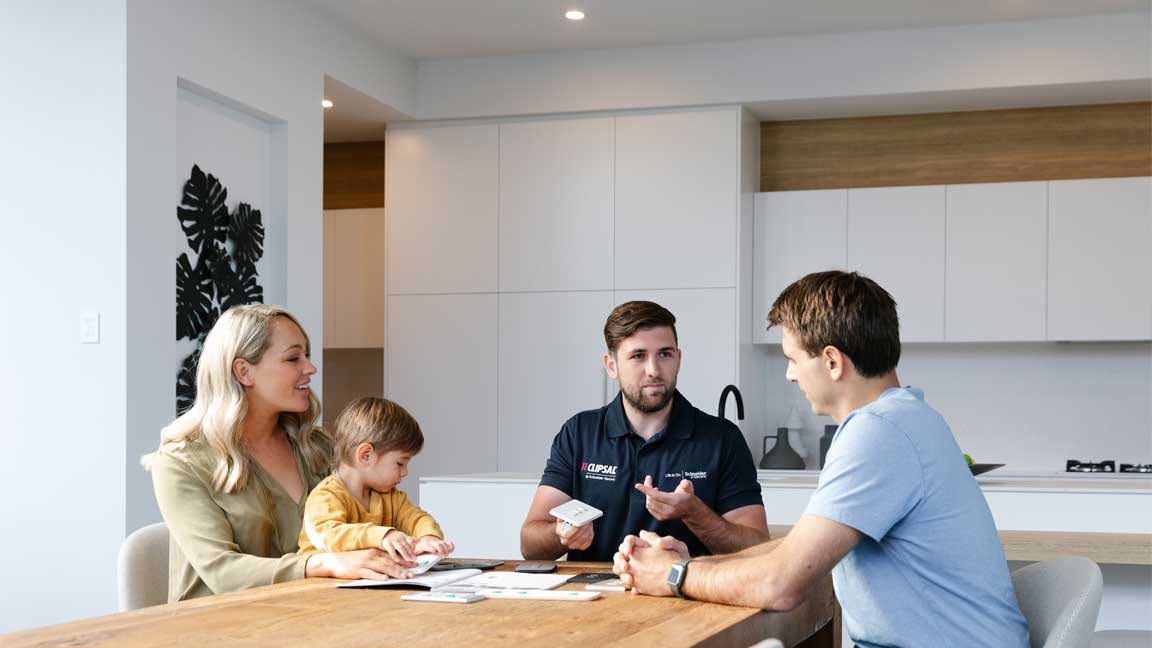 Homeowners viewing Clipsal products