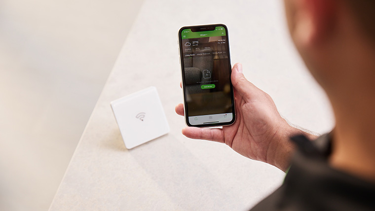 Man using Schneider Assist on his smartphone