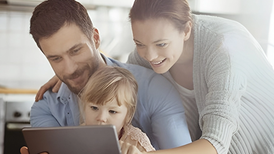 A family reviewing a checklist of safety resources.