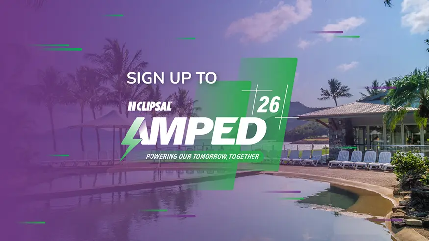 A panoramic view of Hamilton Island with the AMPED26 logo overlaid over.