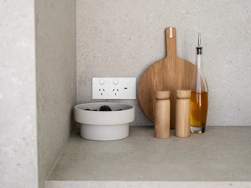 A Clipsal Solis power point in matte white installed in a kitchen.
